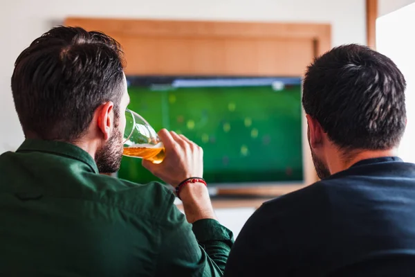 Two Guys Drinking Beer Watching Football — Stock Photo, Image