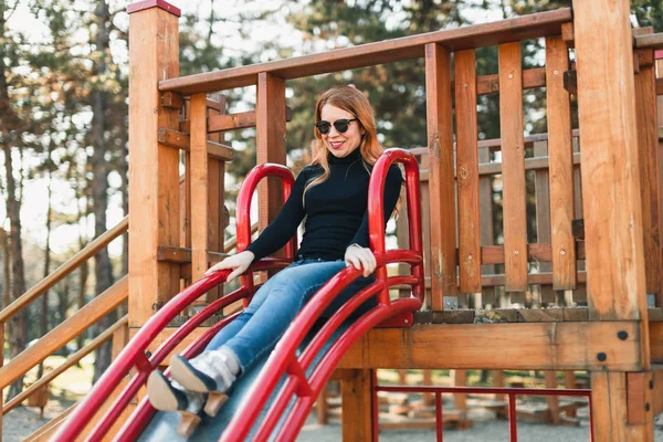 Young Happy Woman Enjoying Slide Public Playground — Stock Photo, Image