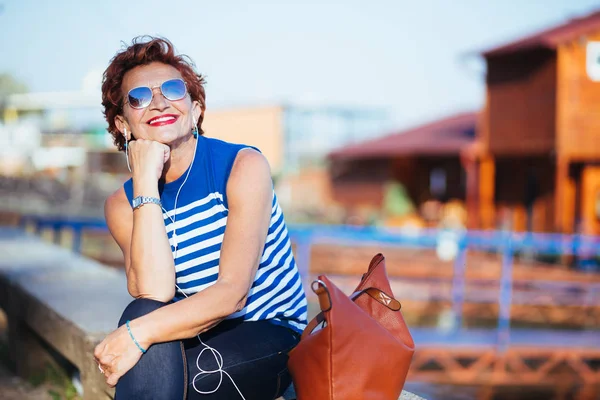 Mature Woman Listening Music Smartphone River — Stock Photo, Image