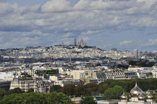 View of the city and the Sacre Coeur Basilica. Paris.