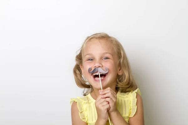 Free time for fun. Close up portrait small girl with fake mustache with plump — Stock Photo, Image