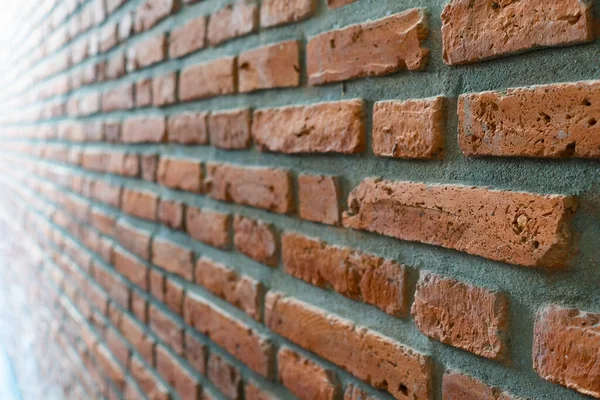 picture of orange brick wall for construction. background concept (selective focus)