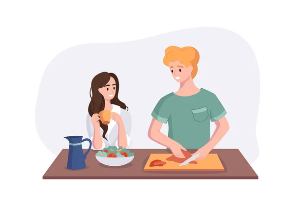 Unga par pratar medan de lagar frukost vid middagsbordet i köket. Kvinnan dricker kaffe och pratar med sin man. Han lagar mat hemma. Manlig tecknad karaktär gör lunch — Stock vektor