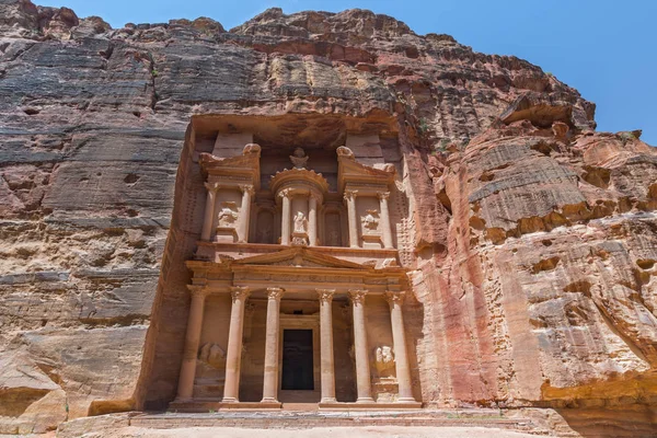 The Treasury of the Pharaoh building carved into the rock face at Petra in Jordan.