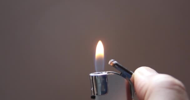 Lighter Burns Small Flame Illuminate Surroundings — Stock Video