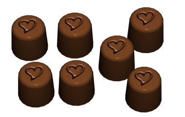 Kutuda çikolata ile süslenmiş çikolatalar.