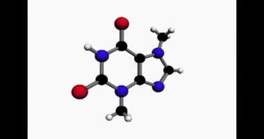Atomik model olarak Theobromine molekülü kendi etrafında döner