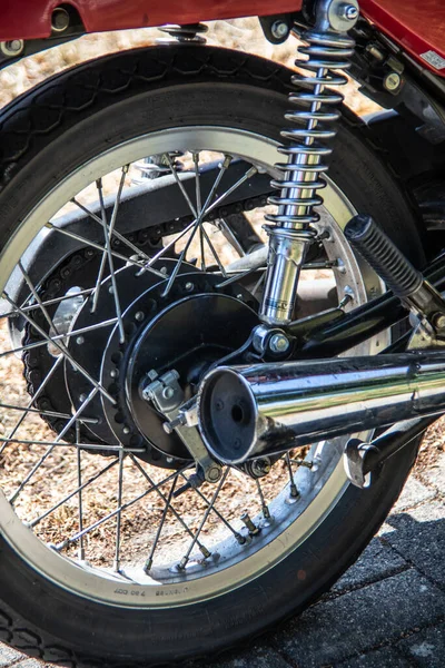 Red Chrome Motorcycle Spokes Exhaust Shock Absorber Close Royalty Free Stock Photos