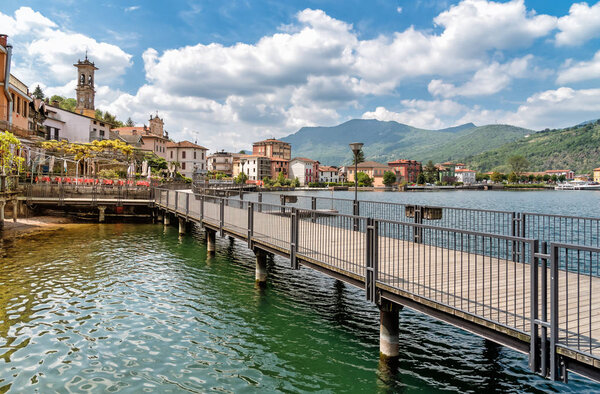 Pedestrian walk along the lake Lugano in delicious little town Porto Ceresio, province of Varese, Italy