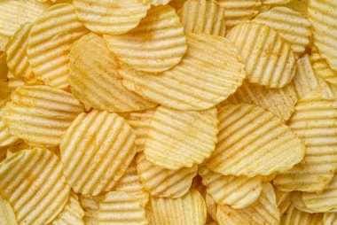 Arka plan dokusu olarak Patates cipsi çerezi. Metin için boş boşluk.