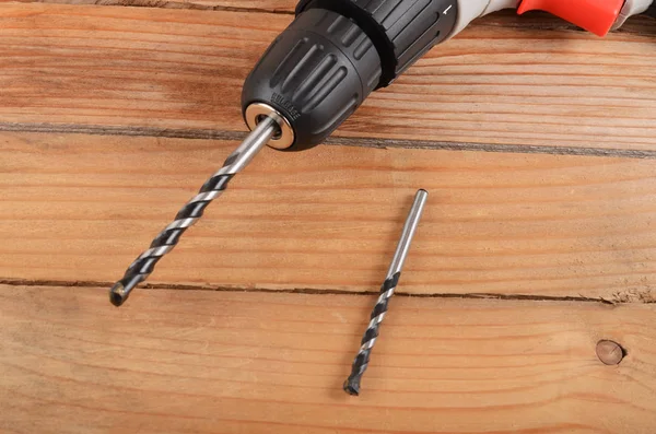 New Electric Drill Wooden Background Stock Image