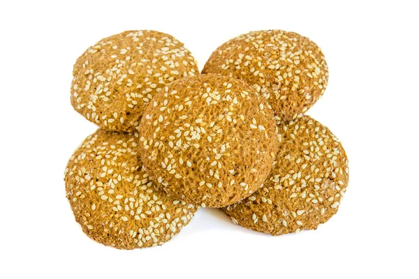 beyaz zemin üzerine susam ile yulaf ezmeli kurabiye