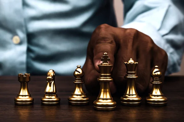 Premium Photo, Golden king chess piece concept for business competition  and strategy.