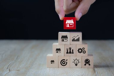 Bayilik işi, İşadamı elle bayilik pazarlama simgeleri mağazası olan tahta blogu seçti.