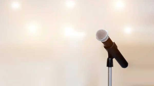 Microphone on the stand for public speaking,Welcoming or Congratulations Speech for Work Success background concept.