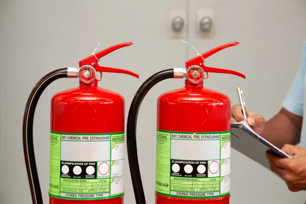 Firefighter Checking Fire Extinguishers Tank Building Concepts Prevention Safety Training — Stock Photo, Image