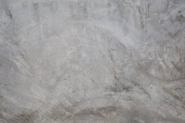 Desenli ve Arkaplan için boş çiğ çimento duvar.