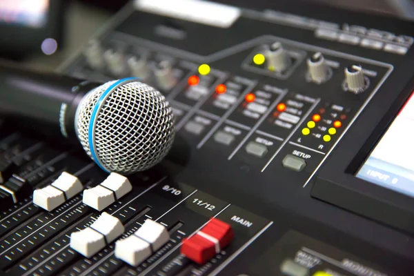 Microphones and sound mixer in the studio for recording editing and sound system control concept.