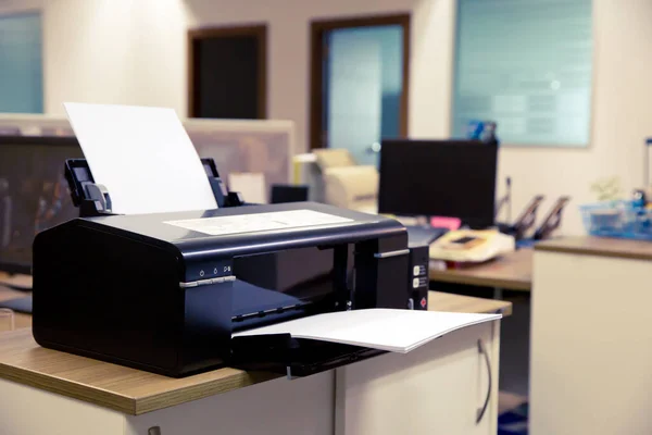 Close-up printer on the table in office.