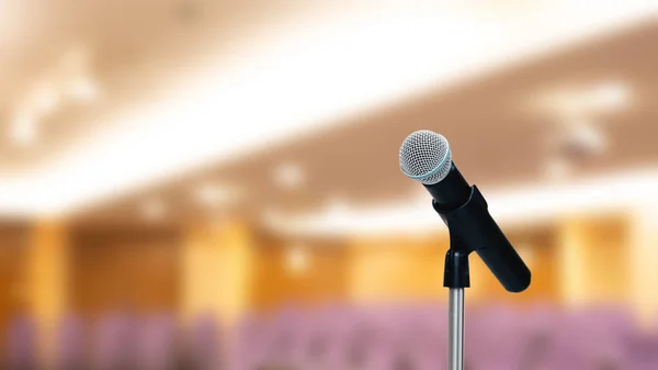 The microphones on the stand for public speaking, welcoming or congratulations speech for work success background concept.