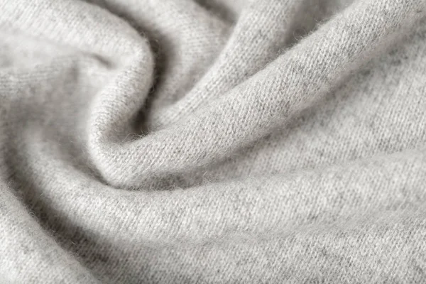Light grey luxury natural cashmere texture as  background with copy space