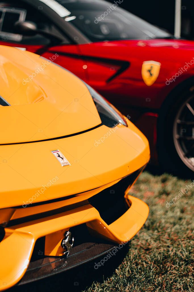 The Farmington Polo Grounds, Farmington, CT USA - August 22, 2020: Front nose view of yellow Ferrari Race Car. The Dream Ride Club.