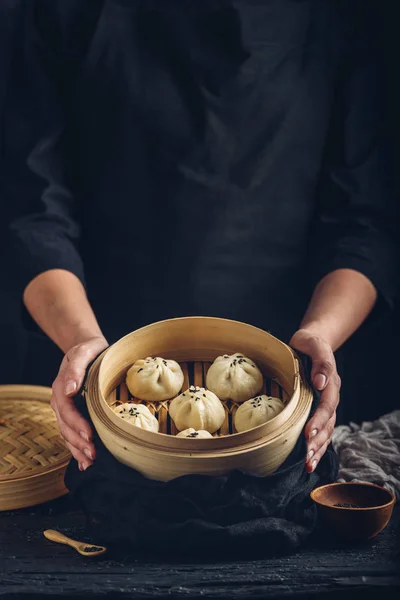 Woman Presenting Dim Sum Dumplings Steamer — Stock Photo, Image