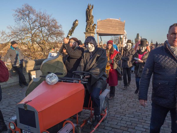 PRAGUE - NOVEMBER 17, 2018 : Celebrating 29th anniversary of the Velvet Revolution - carnival parade on the Charles bridge.