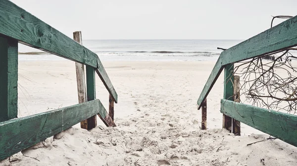 Old wooden beach entrance, color toning applied — Stock Photo, Image