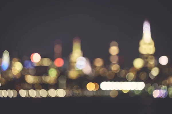 Blurred New York City skyline at night. — Stock Photo, Image