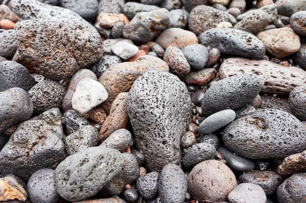 Fondo naturale fatto di ciottoli e rocce vulcaniche — Foto Stock