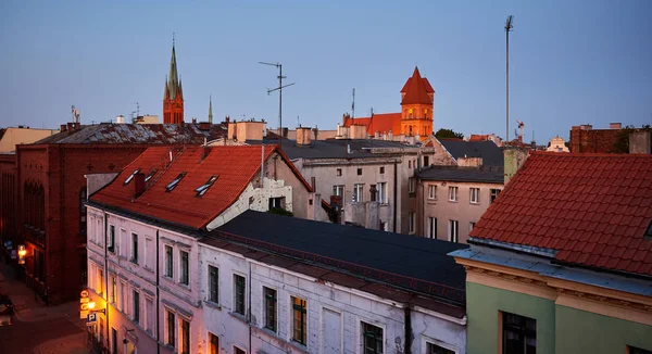 Roofs of Torun old town buildings at sunset, Poland — Stock Photo, Image