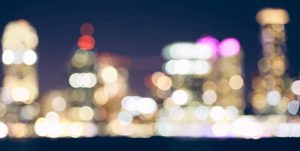 Color toned blurred city lights at night. — Stock Photo, Image