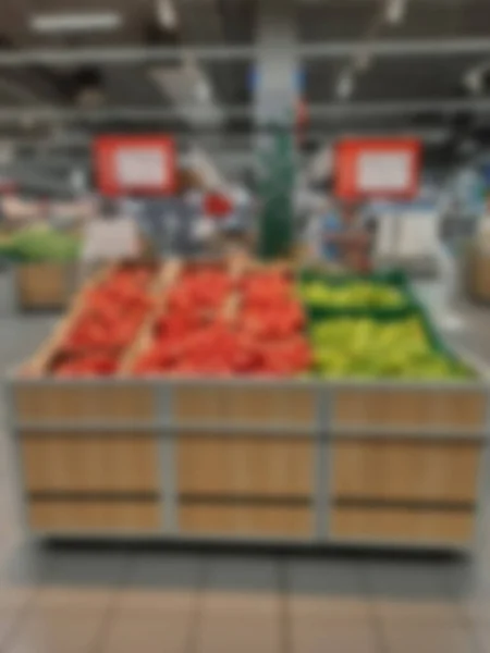 Blurred background of a fruit counter in a supermarket. Product sale.