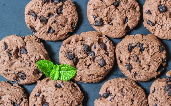 Cookies on black background , chocolate chip cookies
