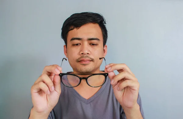 Asian Man Wearing Eye Wear Glasses Hold Glasses Looking Action — Stock Photo, Image