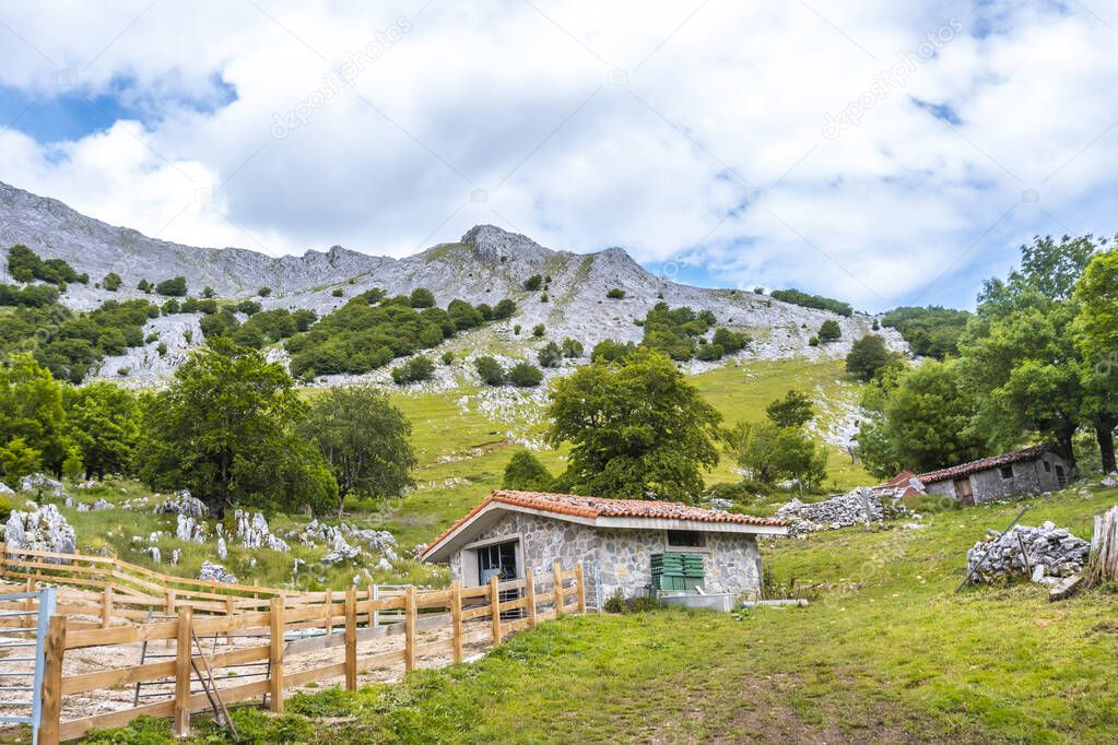 Mount Aizkorri 1523 meters, the highest in Guipzcoa. Basque Country. Ascent through San Adrin and return through the Oltza fields. Farmers hut in a magical setting on the hill climb