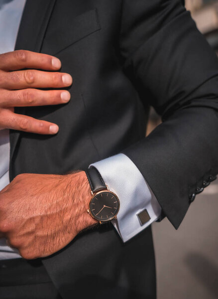 portrait of attractive man in stylish black suit 