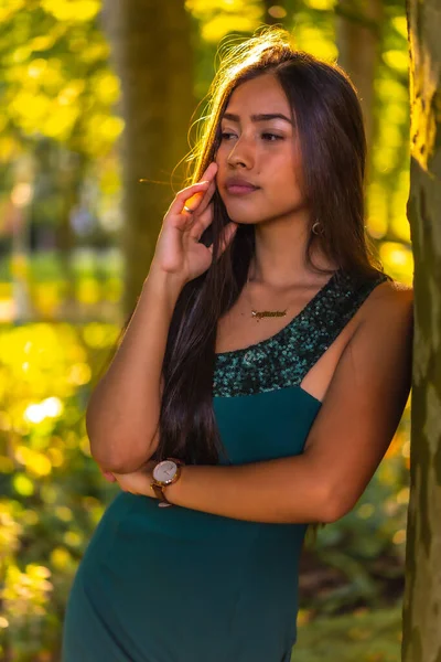 Young Latina Brunette Long Straight Hair Leaning Tree Green Dress — Stock Photo, Image