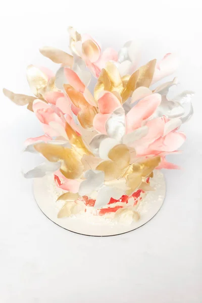 A wedding cake. Festive white cake with butterflies