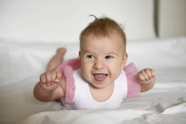 Baby Girl Lying Stomach Holding Her Head Hands Air Making — Stock Photo, Image