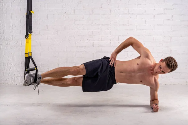 Muscular Young Man Doing Exercises Trx Straps White Brick Wall — Stock Photo, Image