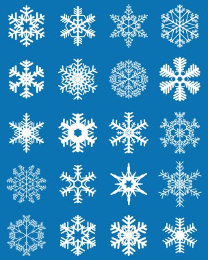 Mavi arkaplanda farklı beyaz kar taneleri.