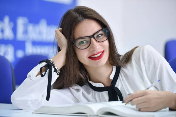 Stressed young female student of school of economics feeling fru