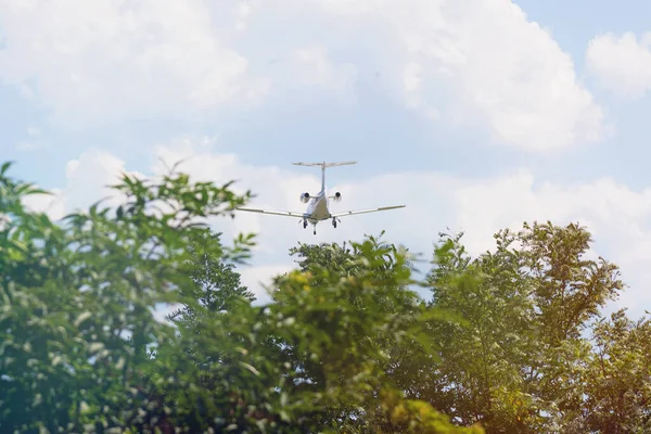 Passenger airplane landing in the airport runway. Passenger plan