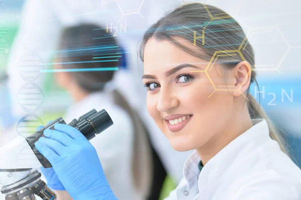 Group of young Laboratory scientists working at lab with test tu — Stock Photo, Image