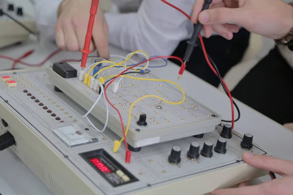 Two young students in technical vocational training, the lesson