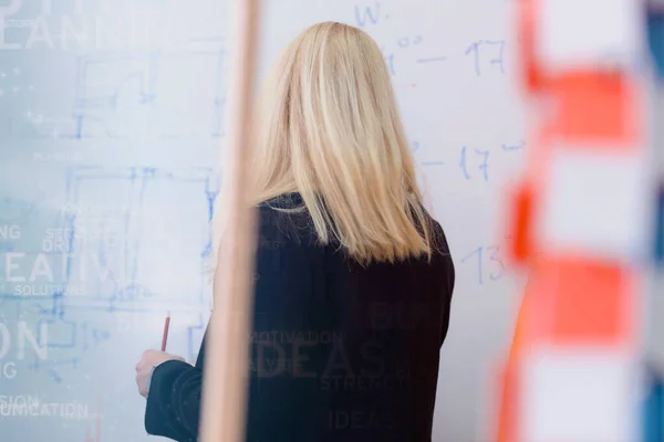 Female young professor explain lesson to students and interact w — Stock Photo, Image