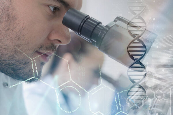 Two young Laboratory scientists working at lab with test tubes a