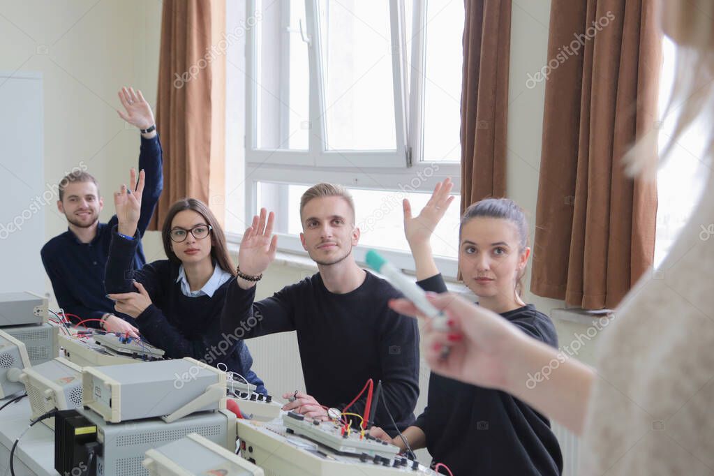Group of young students in technical vocational training with te